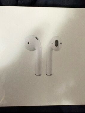 Apple air pods with charging case. Never opened